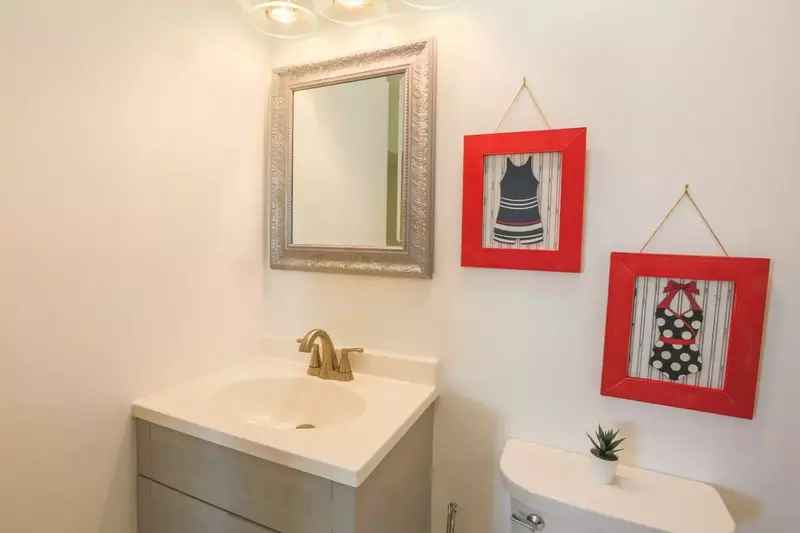 This renovated bathroom is accessed from the hallway near two of the guest bedrooms.