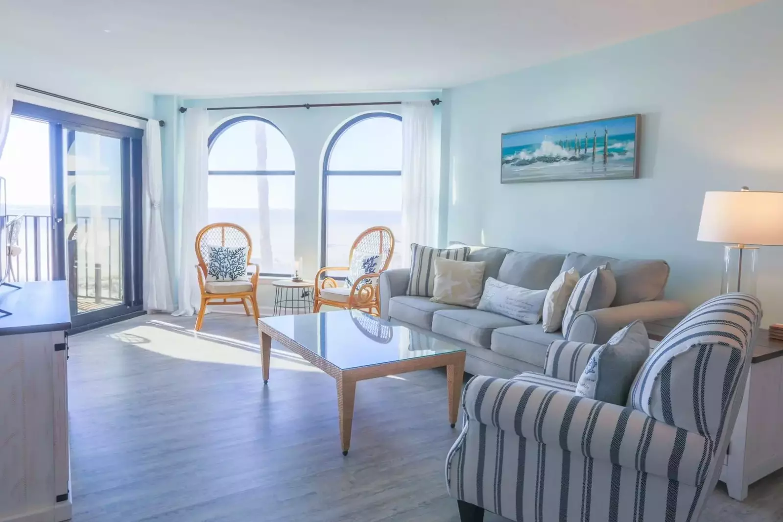 Salty Sunrise features stunning views of the ocean, beach & sand dunes.