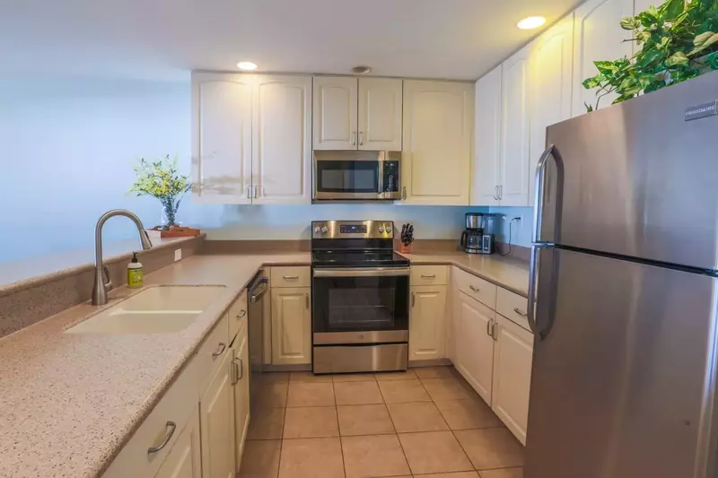 There's plenty of room within the kitchen for you and your family to prepare your meals.