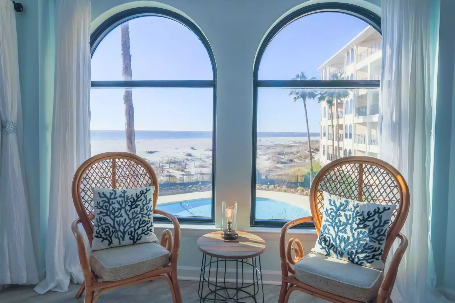 You'll never tire of the gorgeous views of the community pool, palmetto trees, sand dunes & ocean waves.