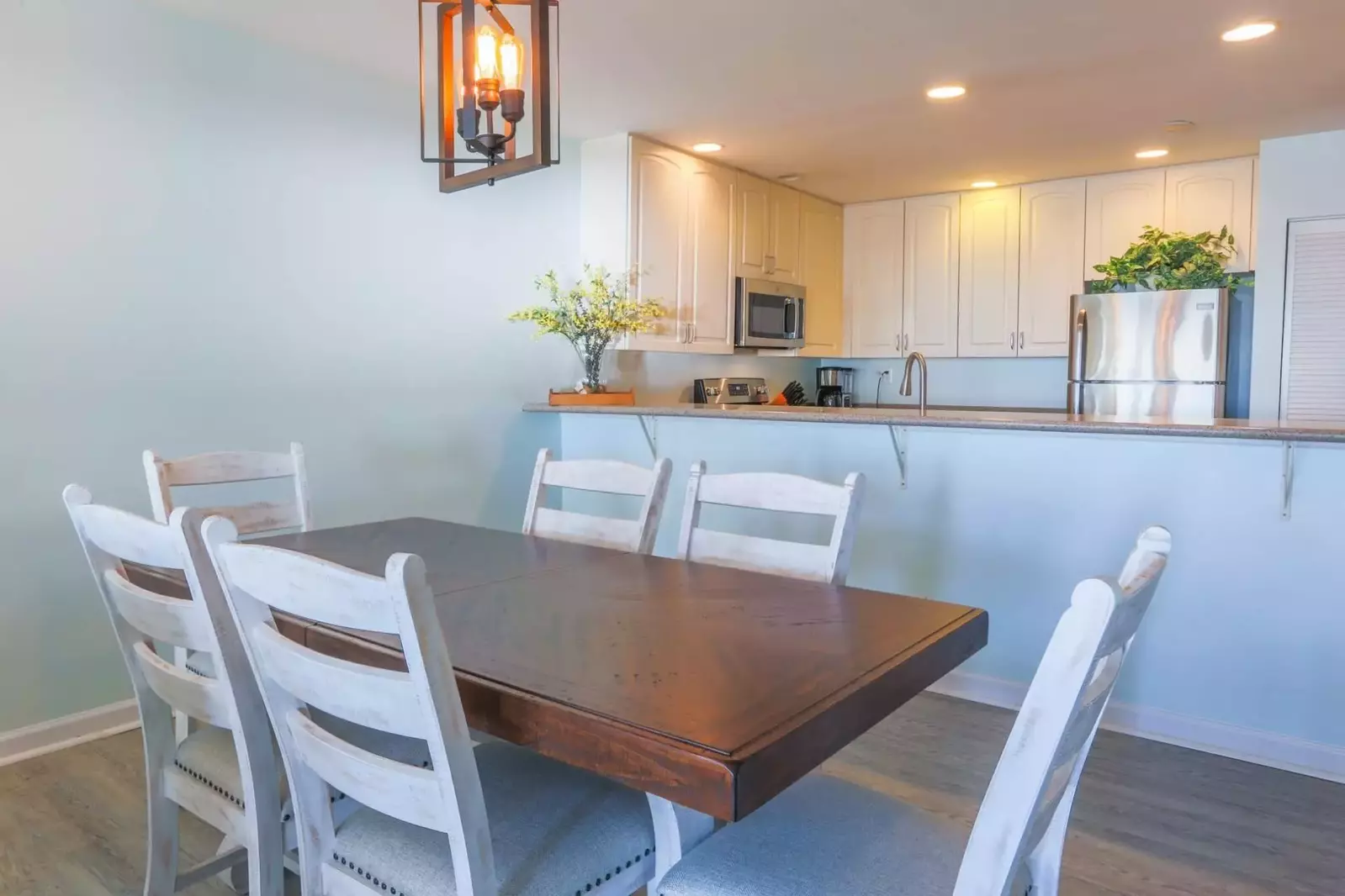 The dining table comfortably seats 6.