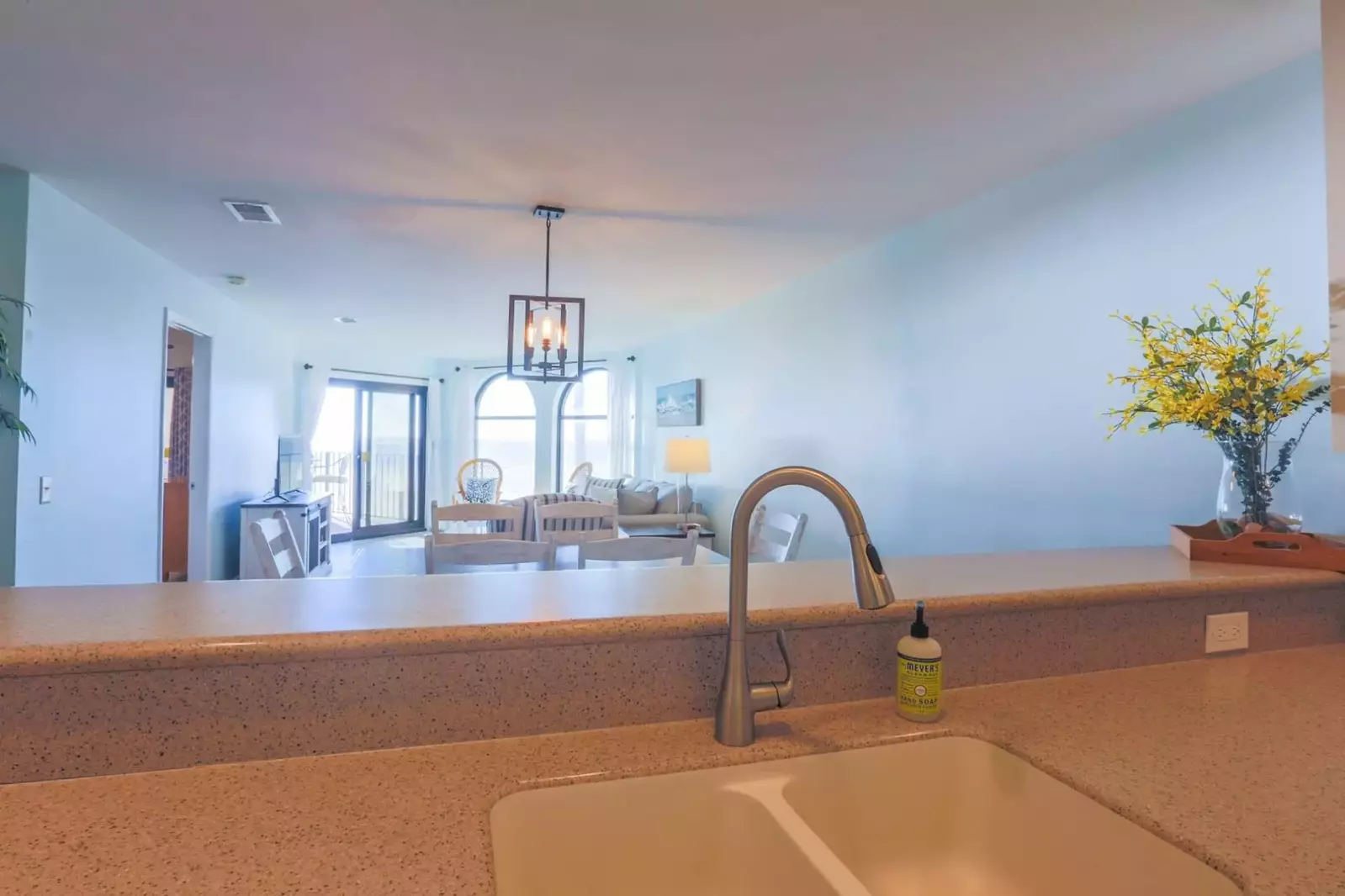 The open layout makes it easy to interact with your guests in the living room or dining area while you are in the kitchen.