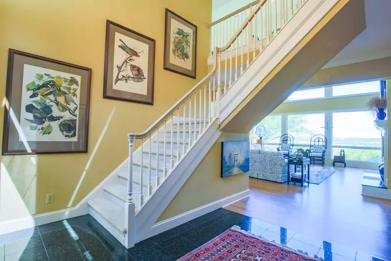 Upon entering the home's front door, you will find the Great Room just beyond the open staircase to the second floor.