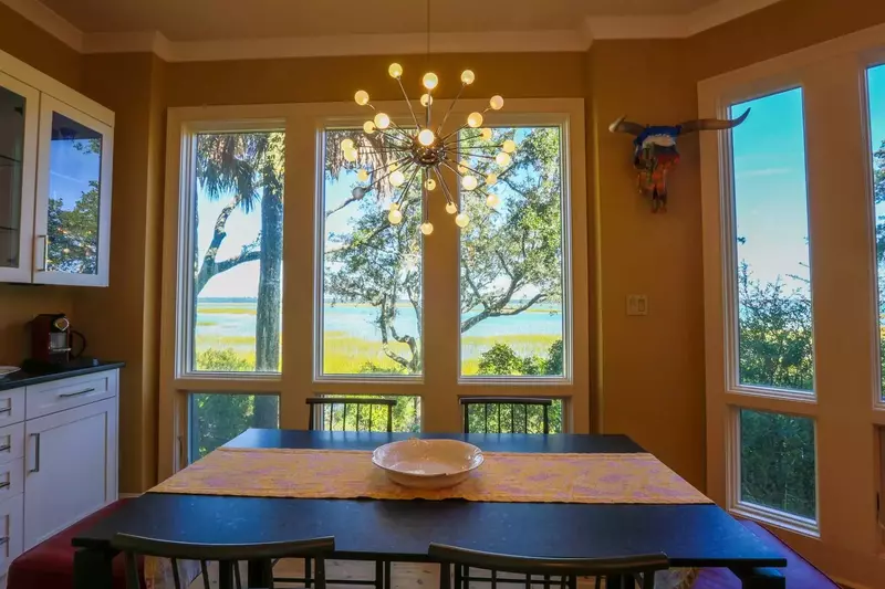 Enjoy breathtaking views of the marsh & Kiawah River from the kitchen table.
