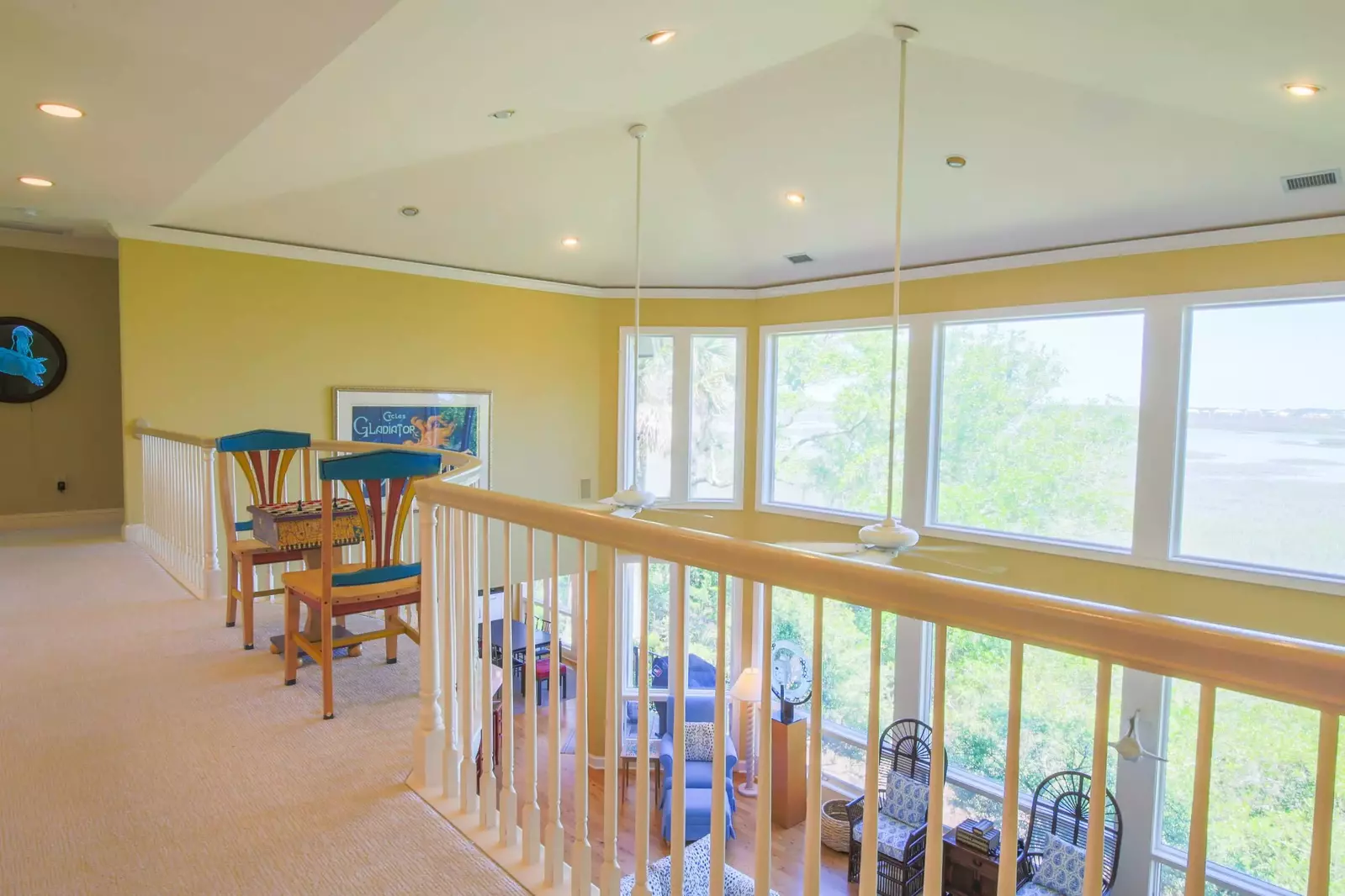 This landing connects the master bedroom suite with one of the home's guest suites.