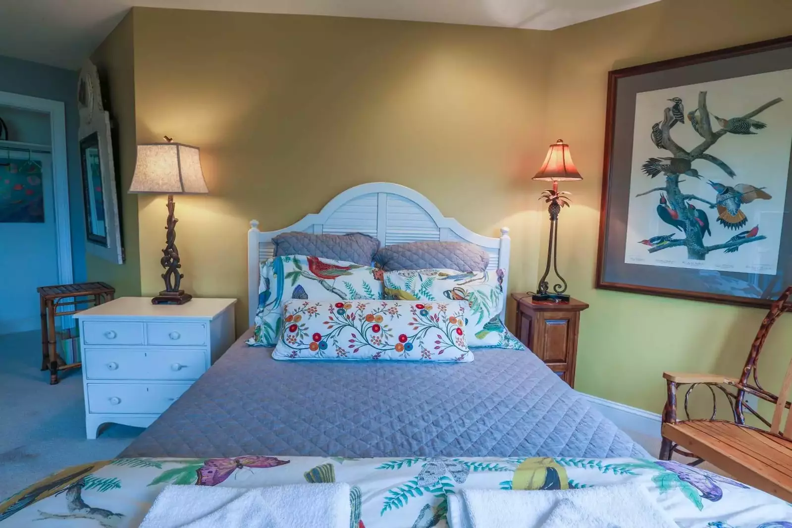 This guest suite also has nightstands with reading lamps and a seating area.