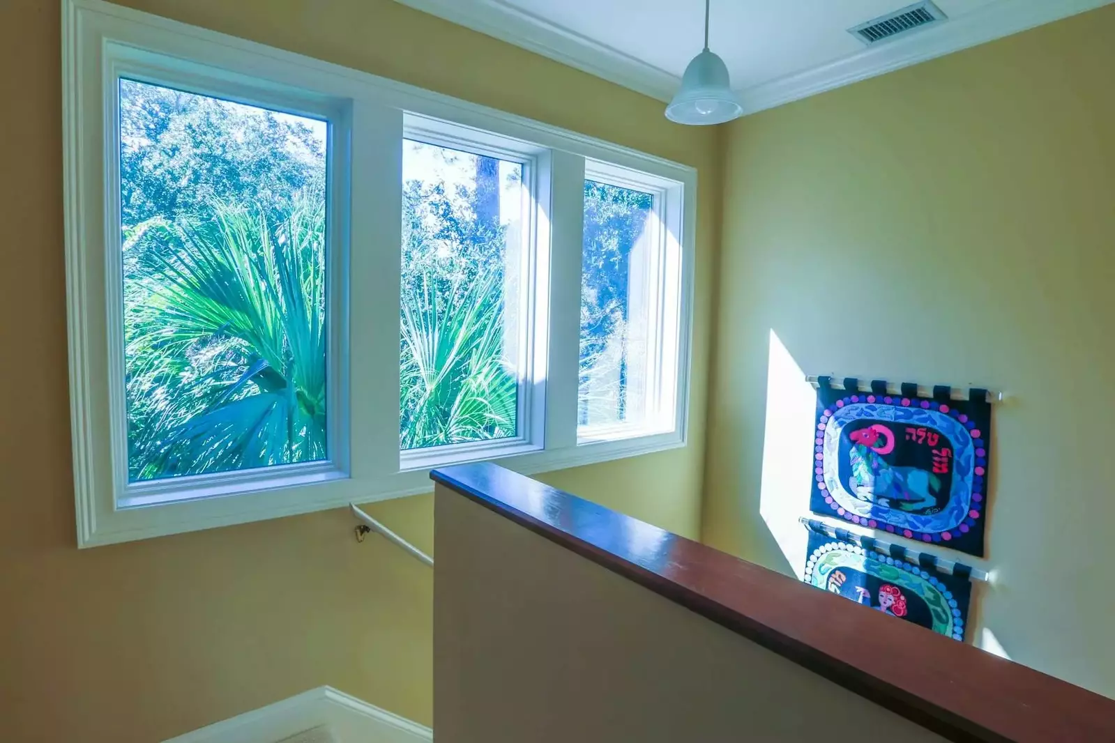 This second staircase connects the first and second floors of the home near the kitchen.
