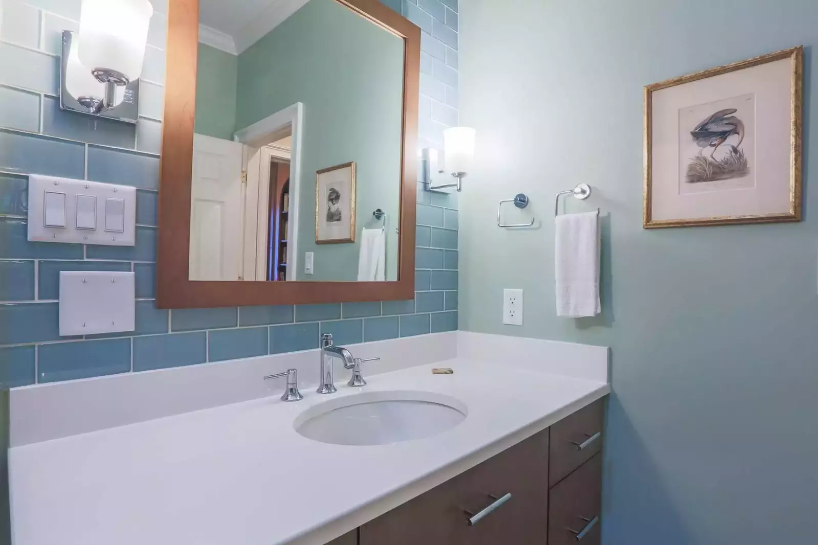 This bathroom is accessible from both the twin bedroom and the hallway near the den.