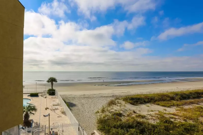Sunshine Daydream is situated near the beach access point and one of the two oceanfront community pools.