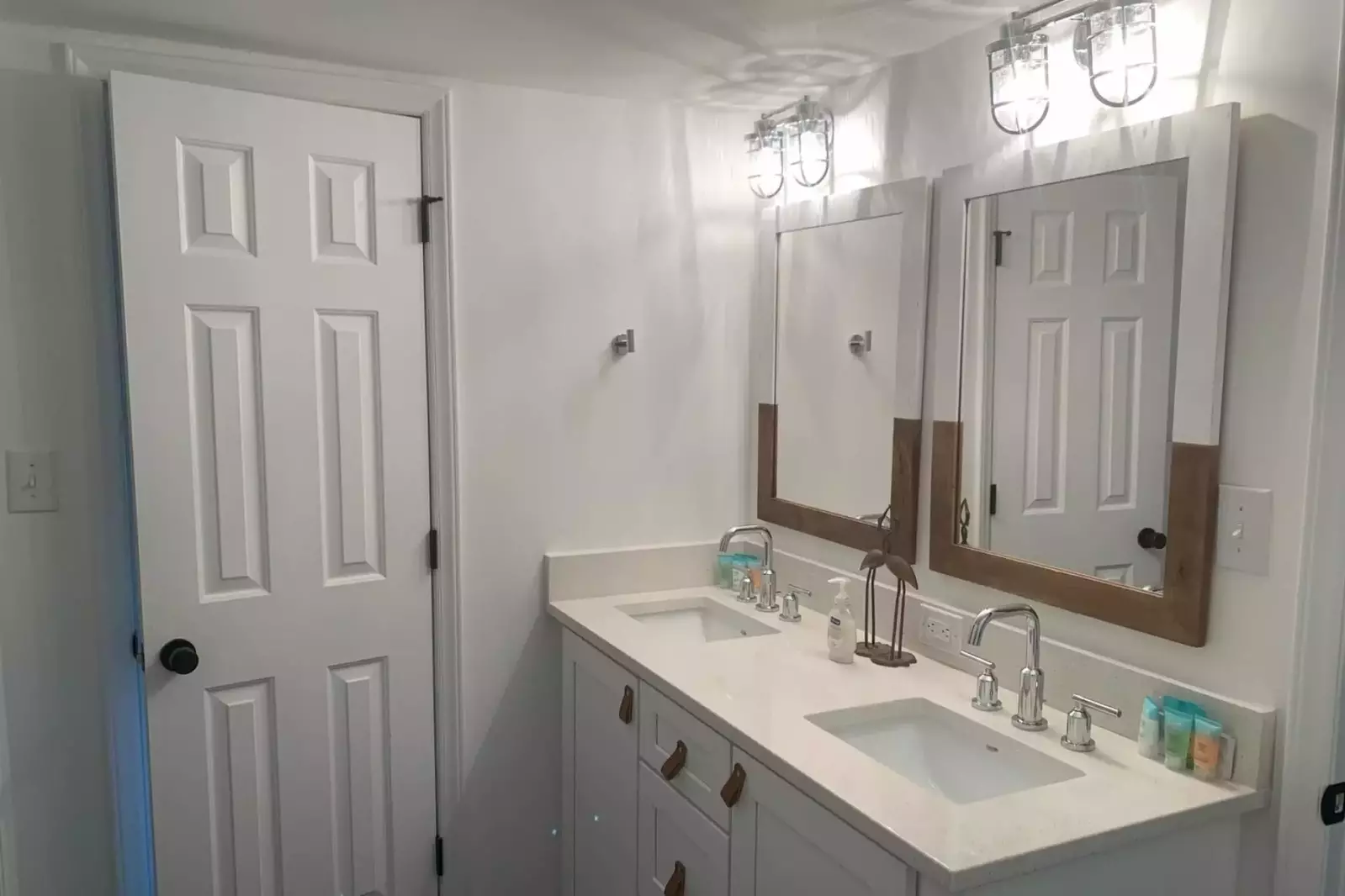 This bathroom -- with its double sink vanity -- separates the bunk bedroom and the guest bedroom.