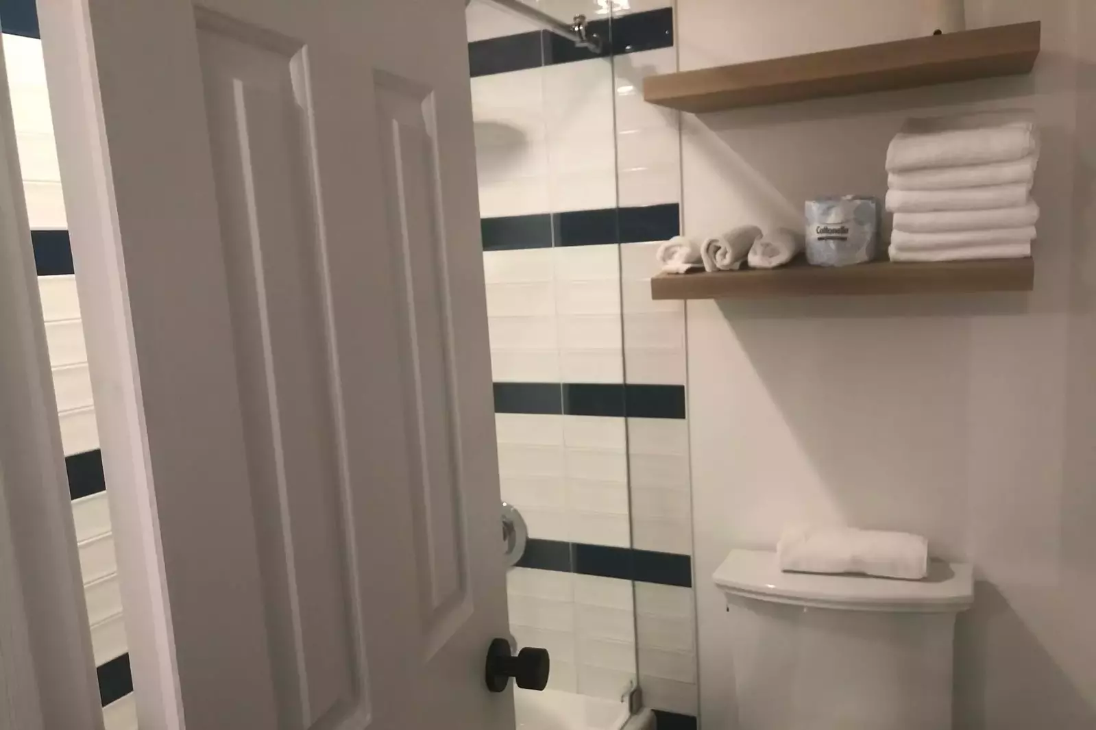 The Jack & Jill bathroom features a separate room for the toilet & shower/tub combo.