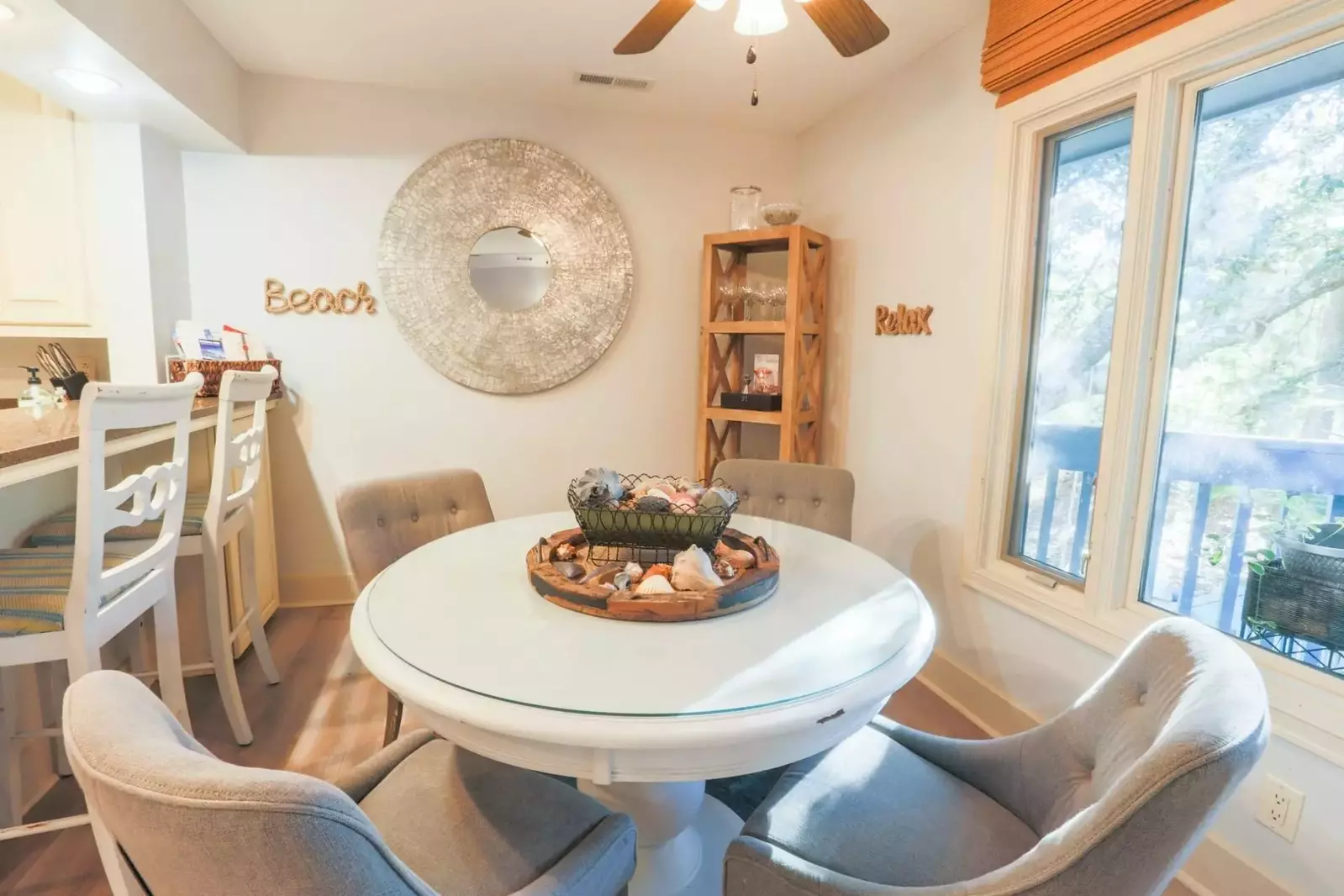 The indoor dining table seats 4 people.