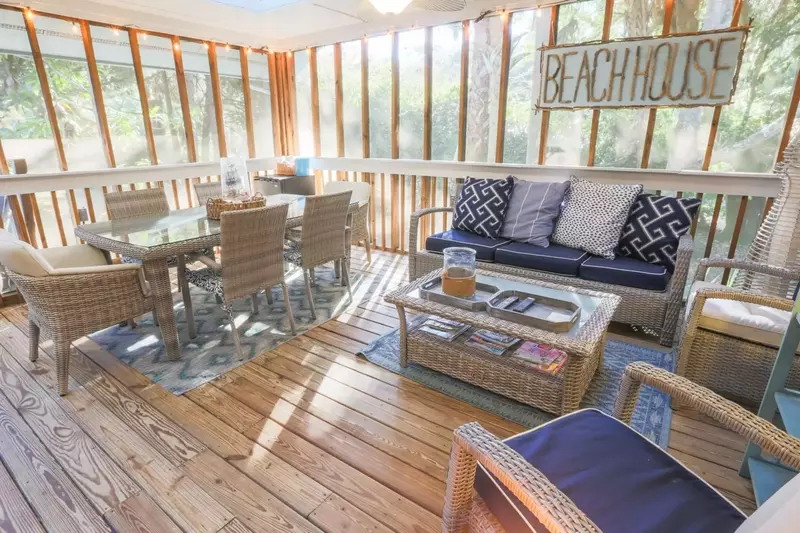 You'll love this fabulous screened porch, which is located off the living room and one of the home's master suites.