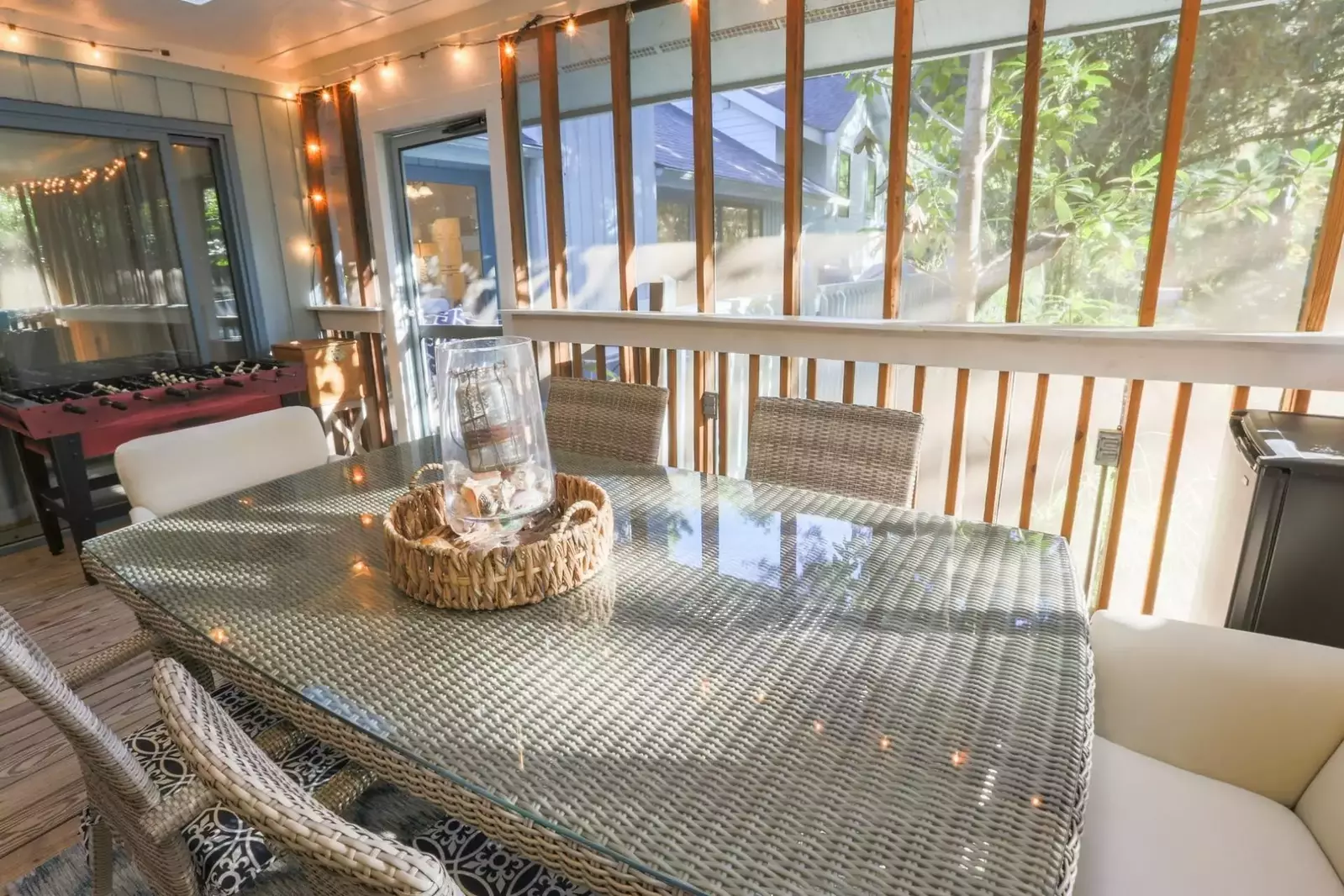 There's an exterior door that connects the screened porch to the deck and backyard area.