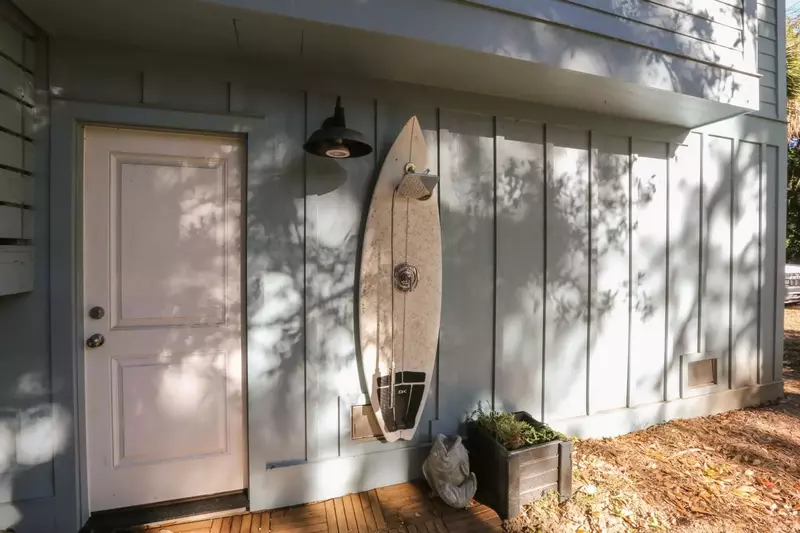 Rinse the sand from your feet  at our cool outdoor surfboard shower once you return home from the beach.