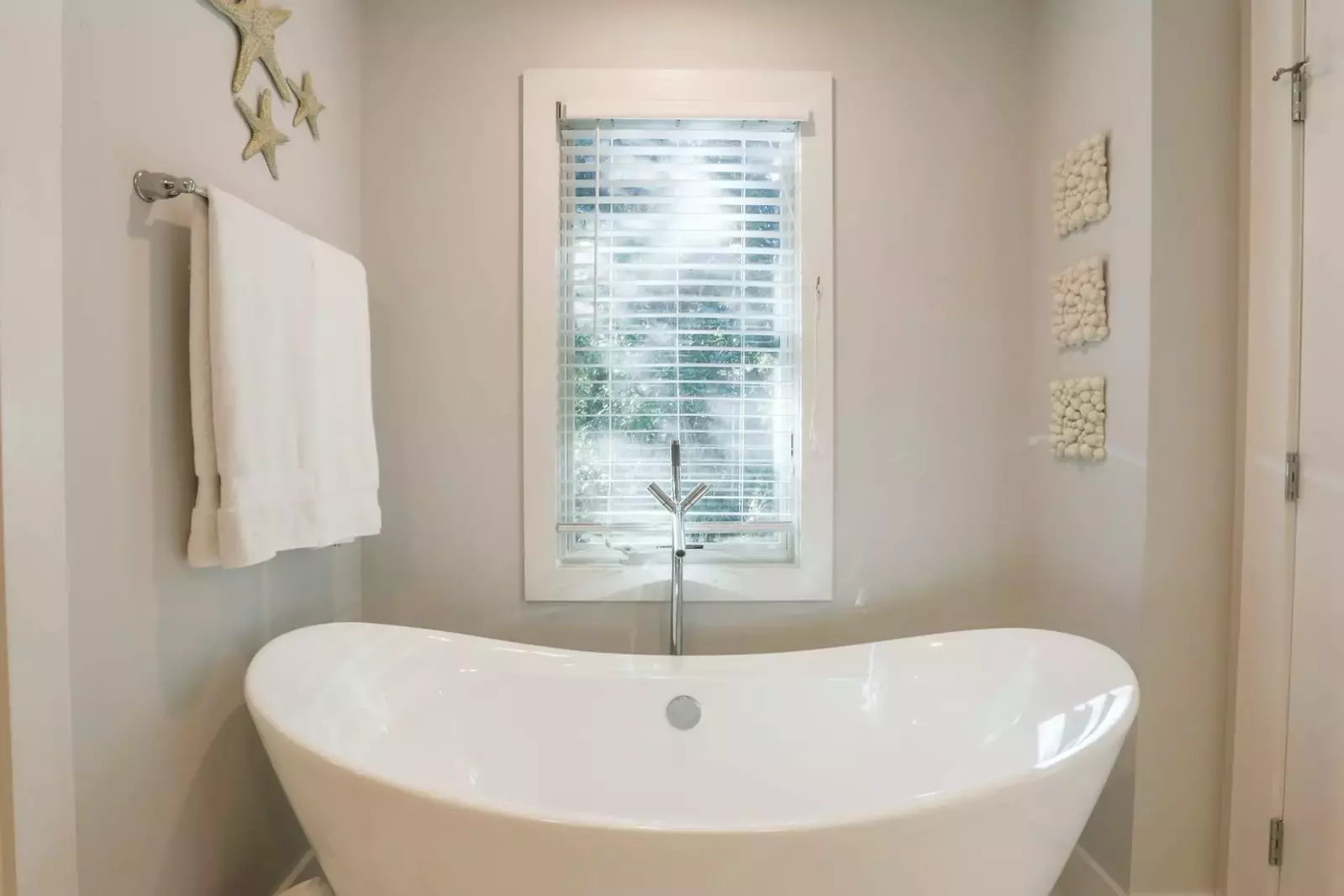 Soak all your cares away in the freestanding bath tub.