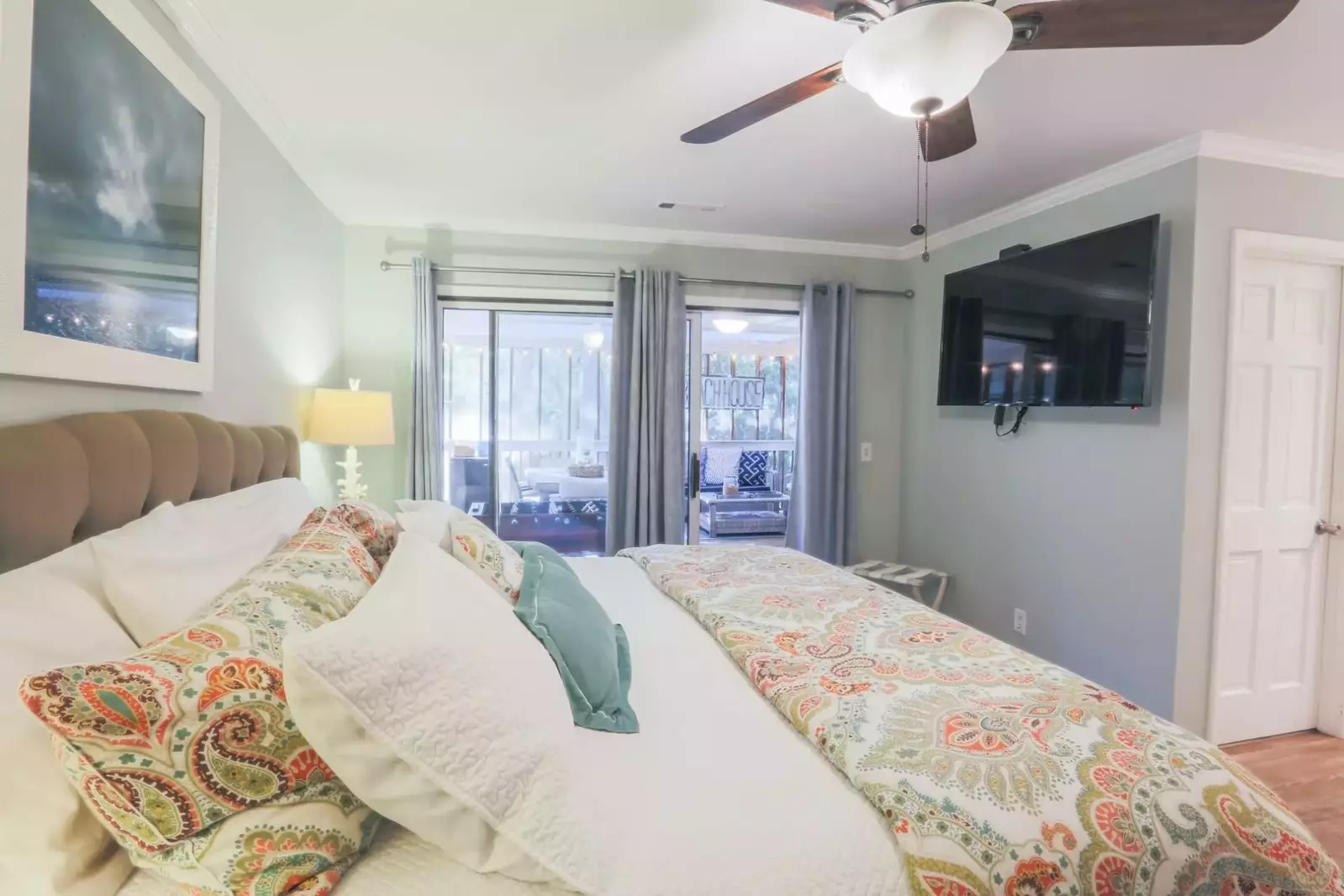 There is a mounted, large screen TV and en suite bathroom.