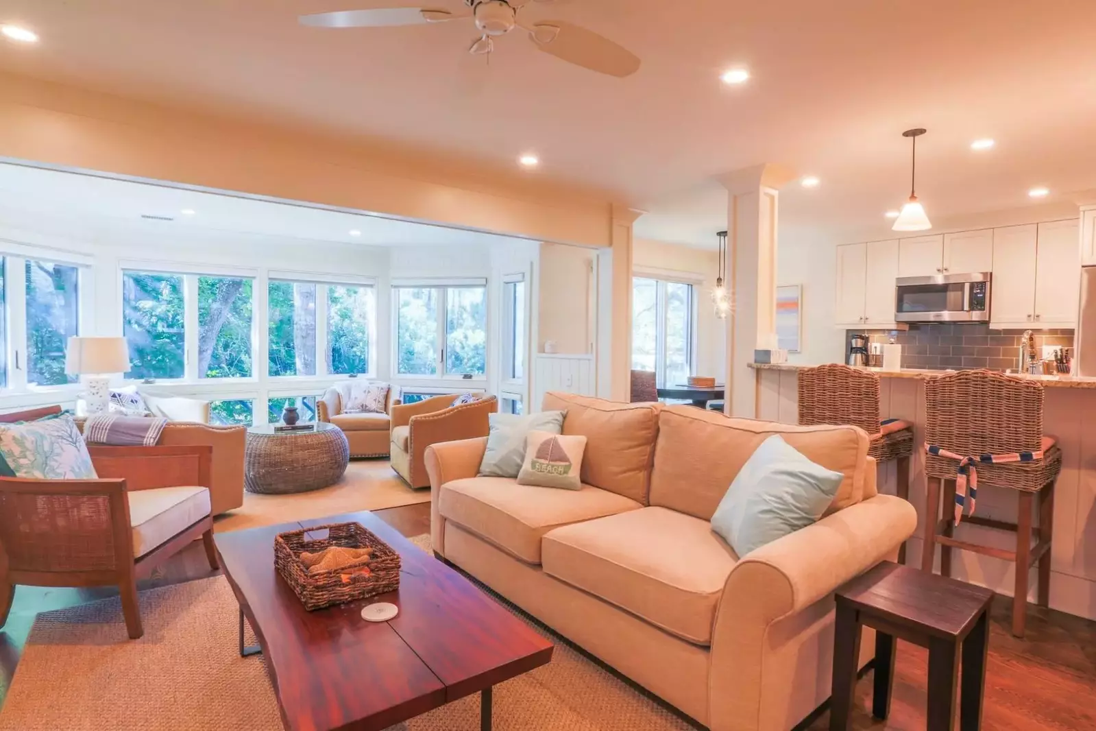 The glassed-in porch provides a perfect second seating area in the living room.