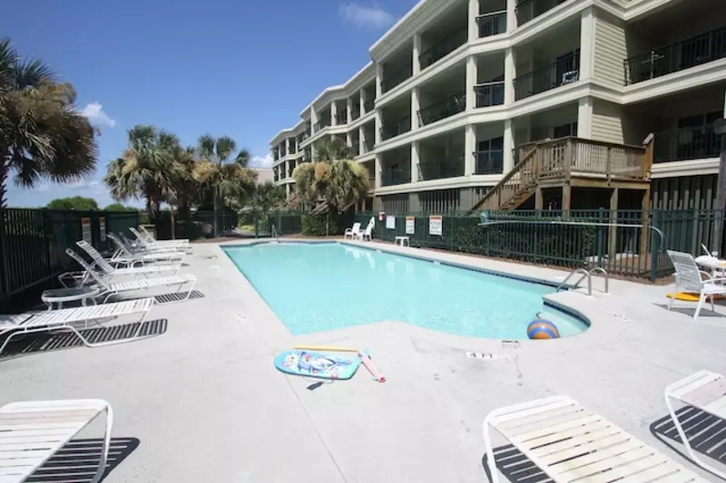 Guests have access to the building's private gated pool.