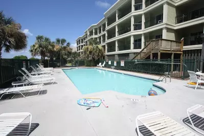 Guests have access to the building's private gated pool.
