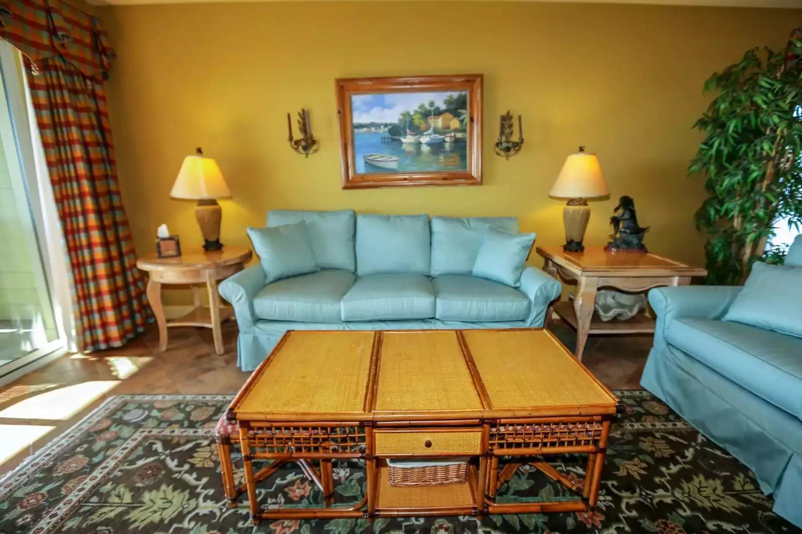 You'll love the tropical-influenced decor of this distinctive beachfront condo.