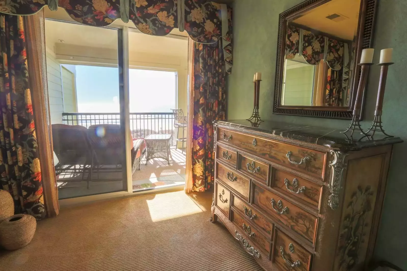 Walk out of the sliding door in the master bedroom and onto the oceanfront balcony.