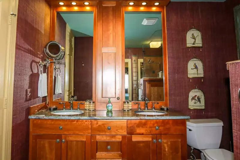 The master bathroom also features a his & her double-sink vanity.