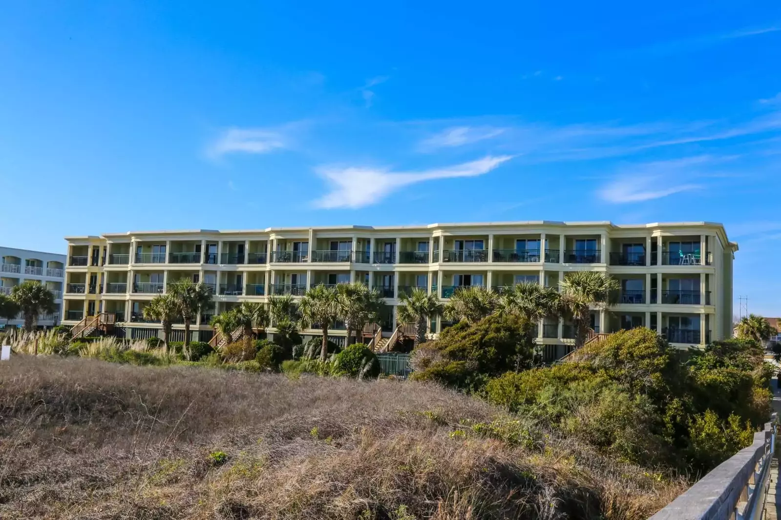 You'll love staying in our penthouse, beachfront condo!  (Top left of the photo!)