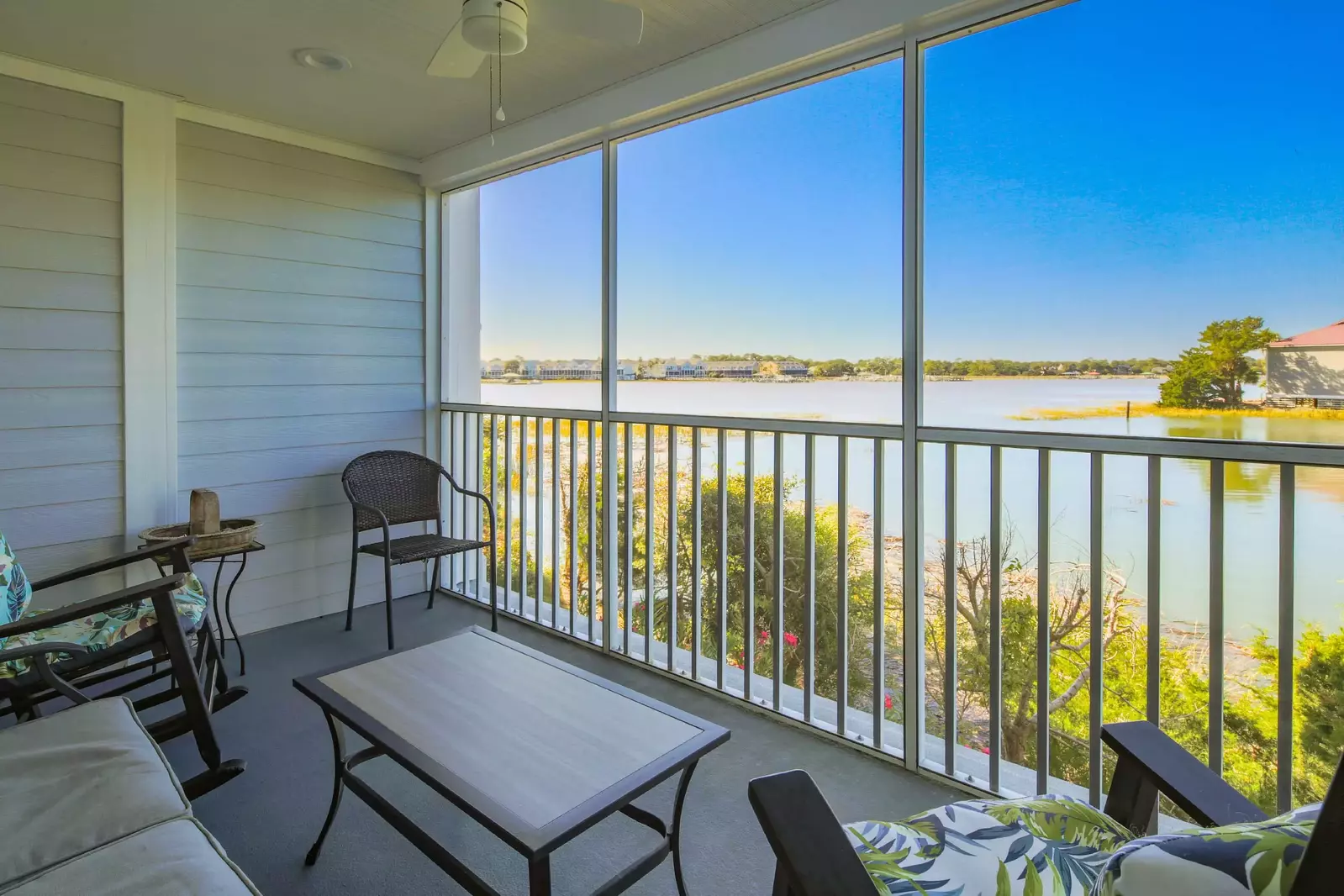Grab a seat on the screened porch and enjoy your morning coffee and this incredible view.