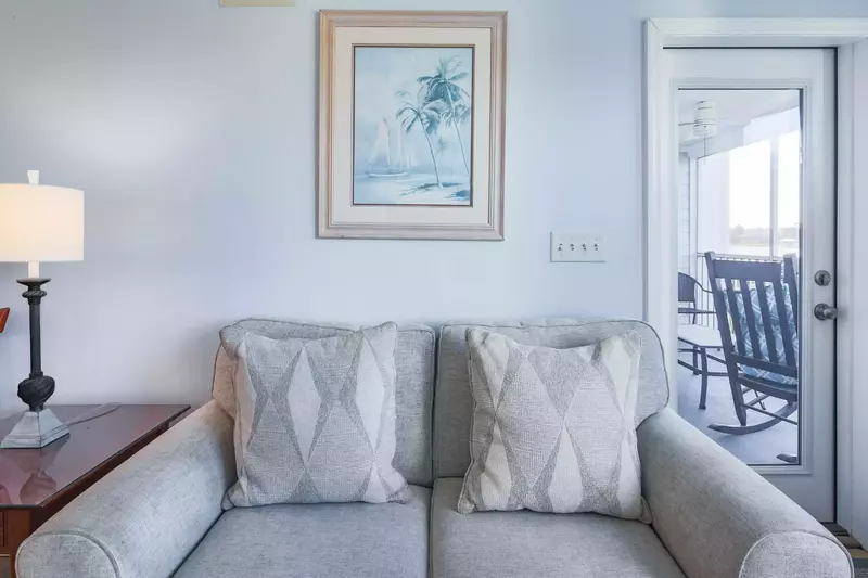 You may access the screened porch from the living room.