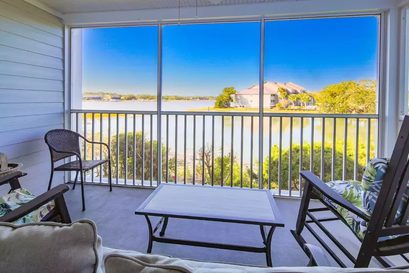 You'll never tire of these views of the Folly River from the master bedroom and screened porch.