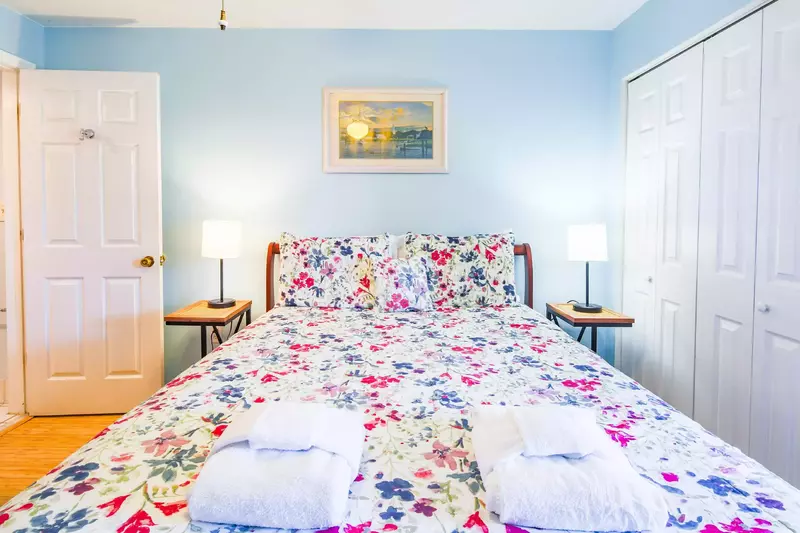Two sets of towels are provided for each bed.