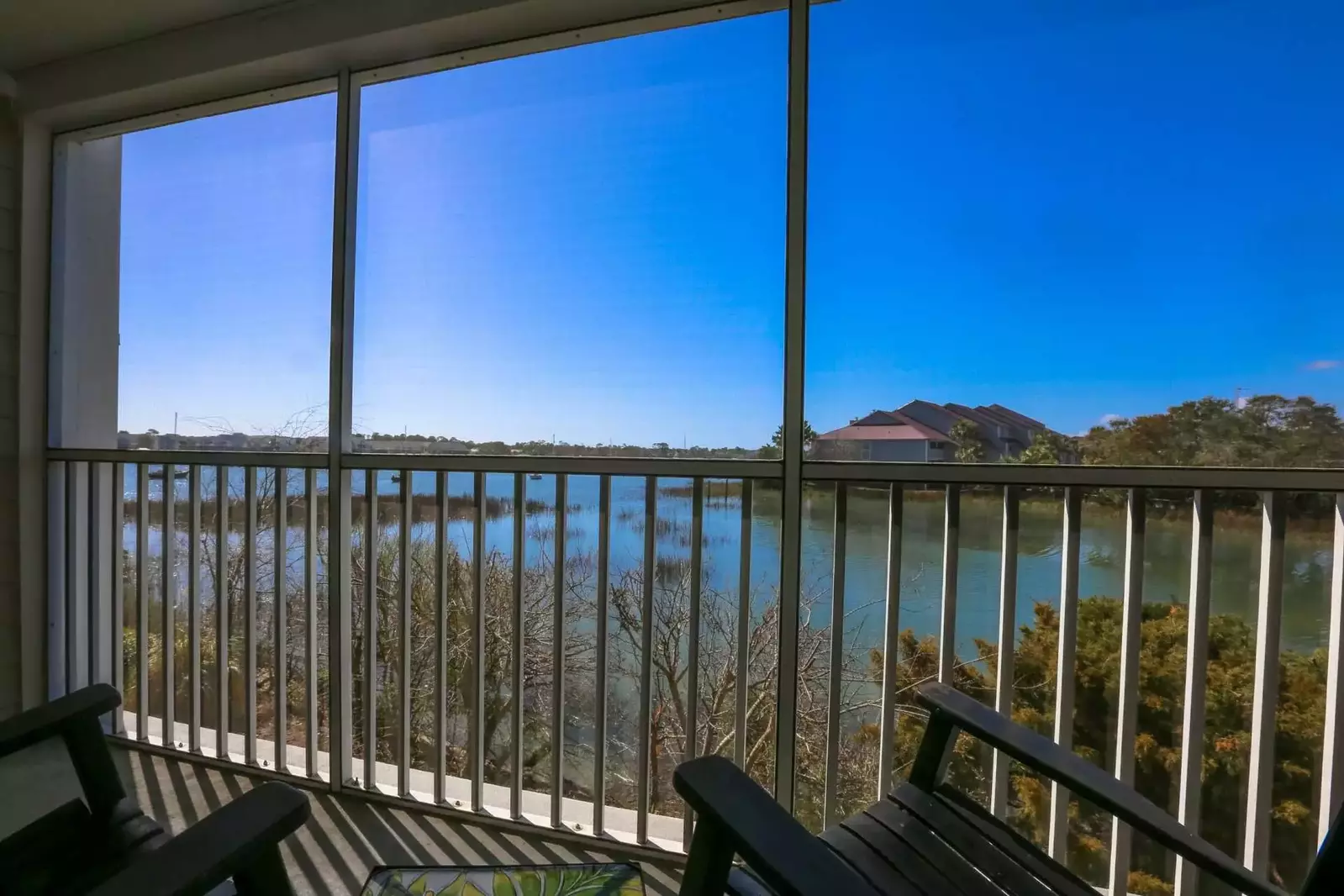 Rock the evening away in our rocking chairs on the screened-in porch off the master bedroom.