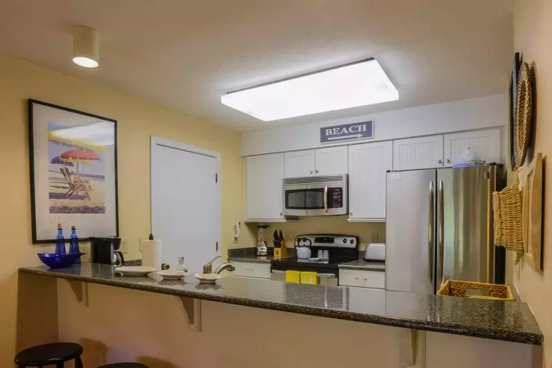 You'll find a beach cart, beach umbrella and beach chairs in the kitchen pantry closet.