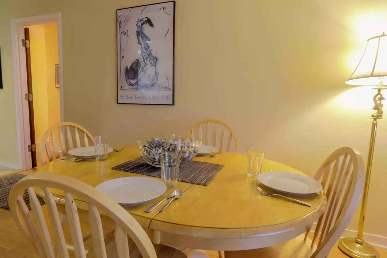 The dining room table comfortably seat 4 people.  There is additional seating for 4 people at the kitchen's bar.