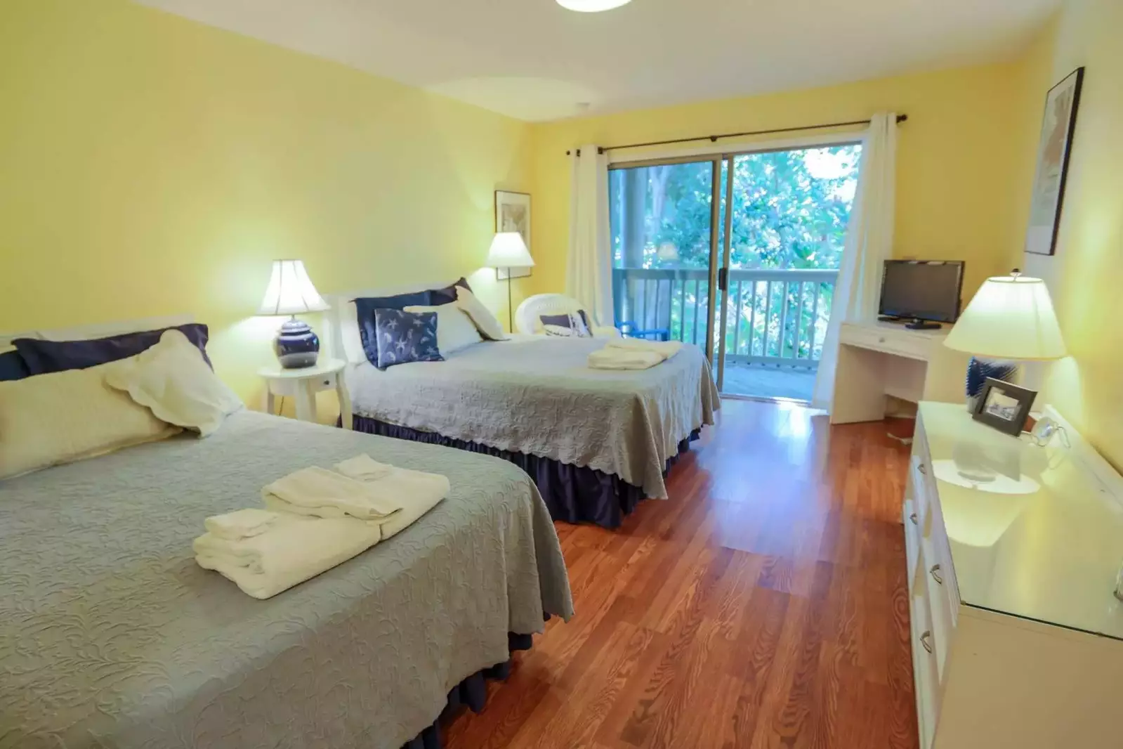 Both bedrooms feature 2 queen beds, a private balcony and en suite bathroom.