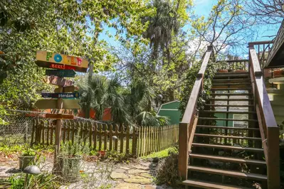 Climb up these stairs to reach the front door and large, wraparound deck.
