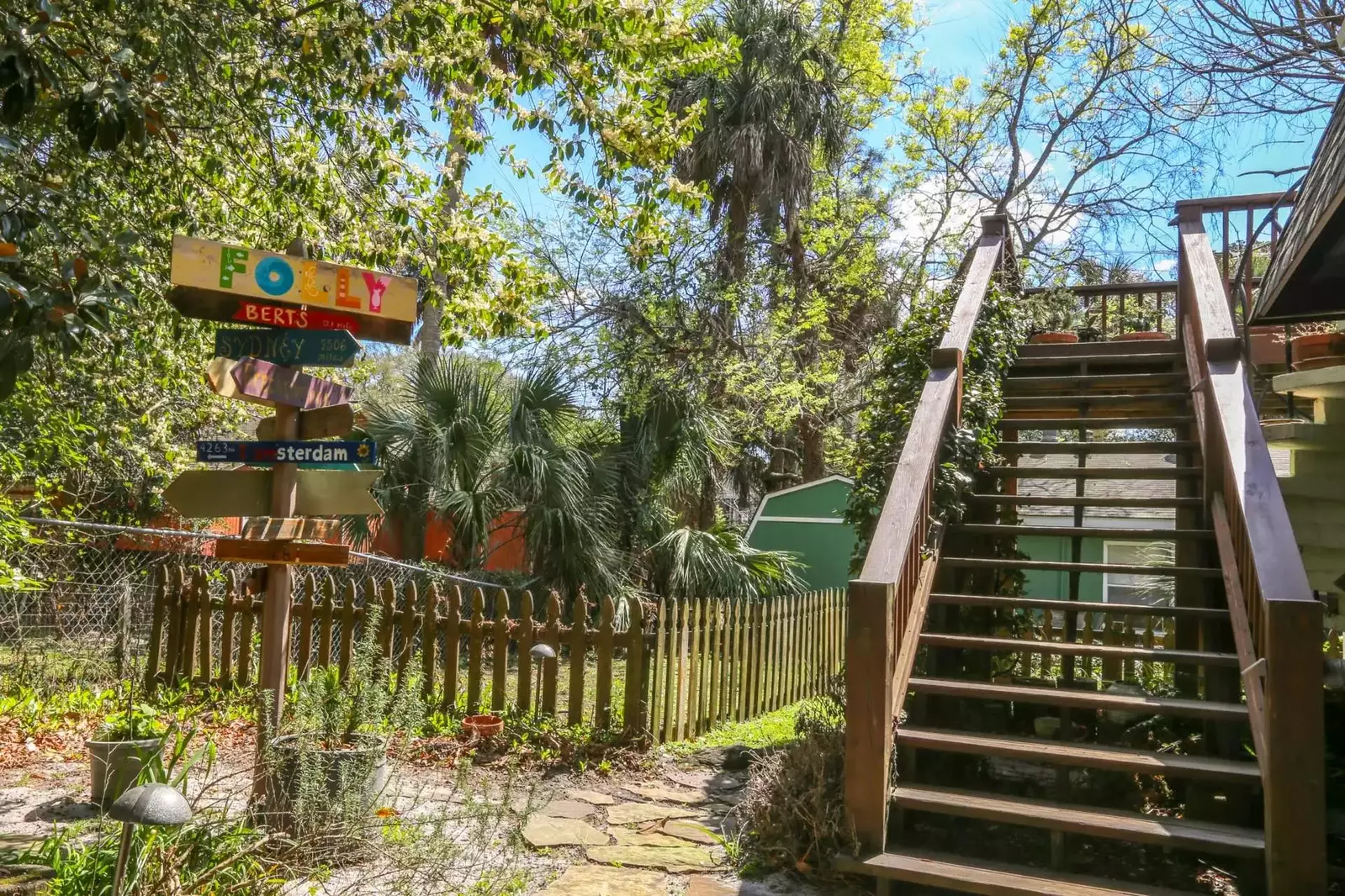 Climb up these stairs to reach the front door and large, wraparound deck.