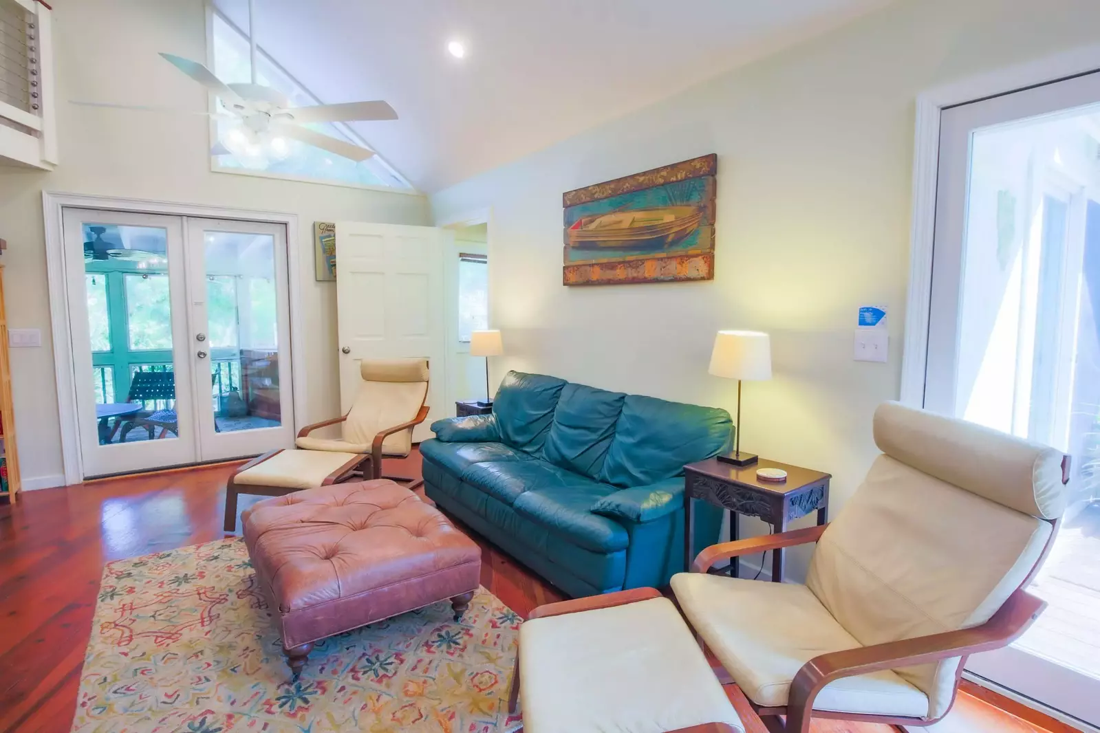 The home's screened-in porch is located just off the living room.