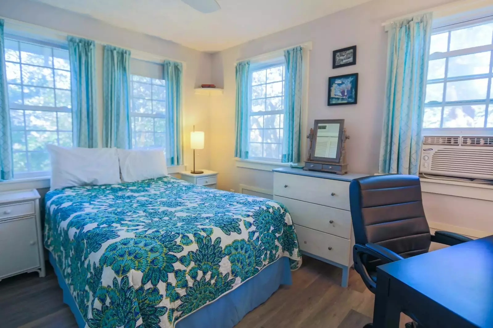 The upstairs guest bedroom features a full bed.