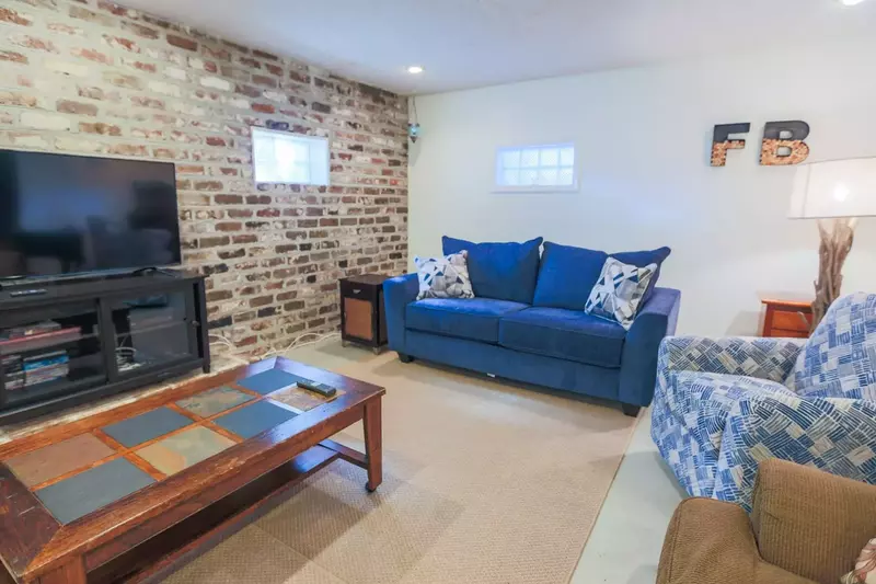 There are two full sized sleeper sofas in the basement family room.