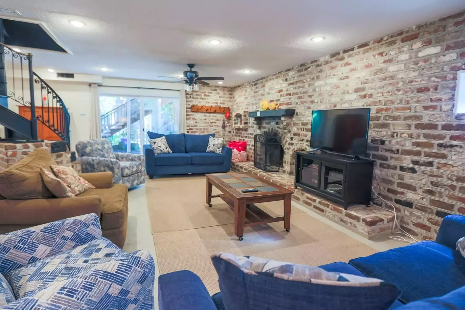 There is also a sliding door in the basement that opens up to the ground floor patio area.