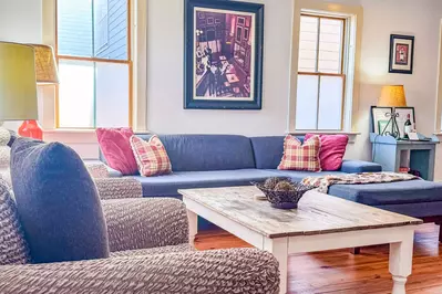 The first floor features hardwood floors and a loft-style spaciousness.