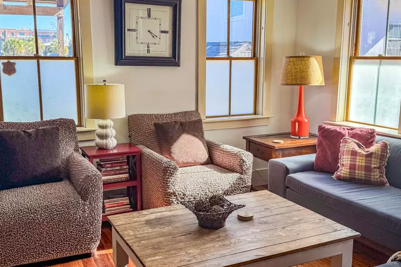 Sweet Spacious Suite receives lovely natural light through its many windows.