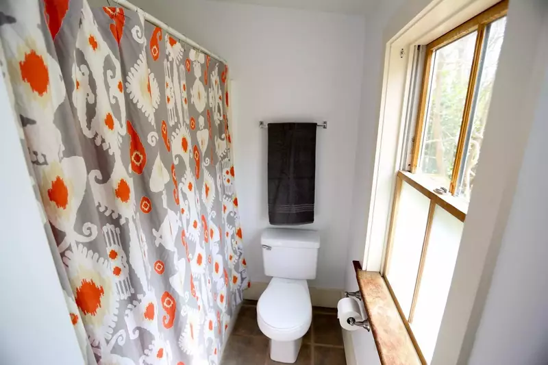 Each of the bathrooms feature a shower-bath combo and lots of natural light.