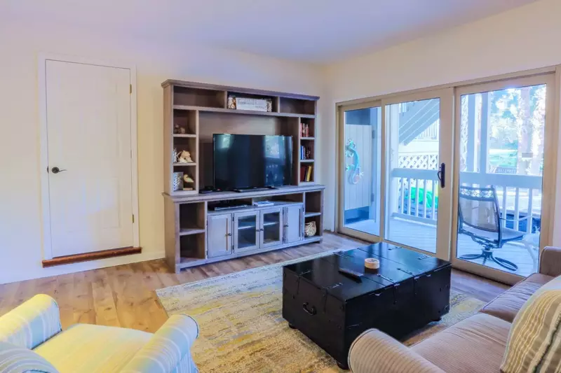 Enjoy a movie night or catch the latest game on this large screen TV in the family room.