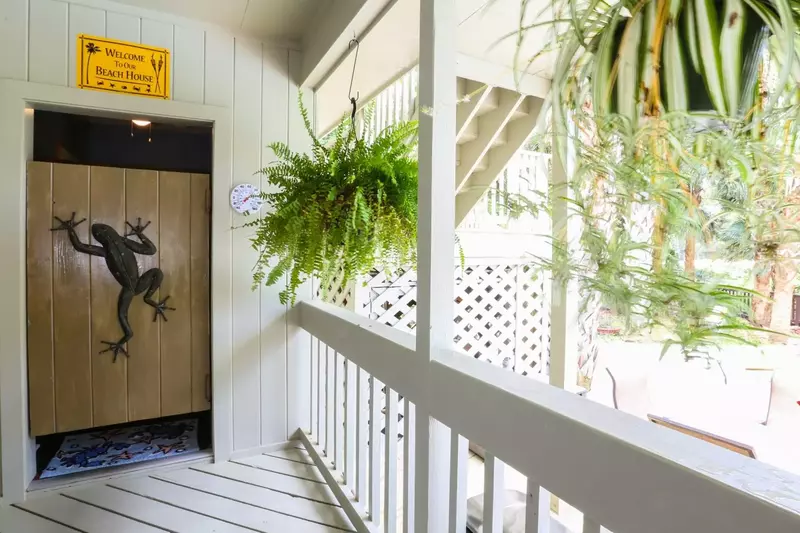Check out the outside bathroom -- great for washing off the sand & salt or just changing for the pool.
