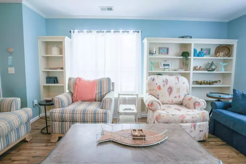 Guests are welcome to play a board game, borrow a book or catch a nap on one of the living room's comfy couches.