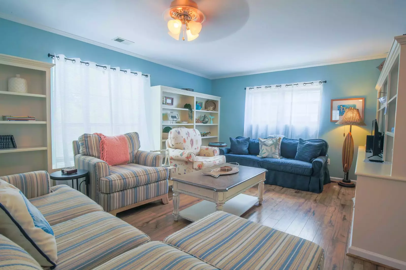 There's plenty of seating in the living room for you to gather together with your family or friends.