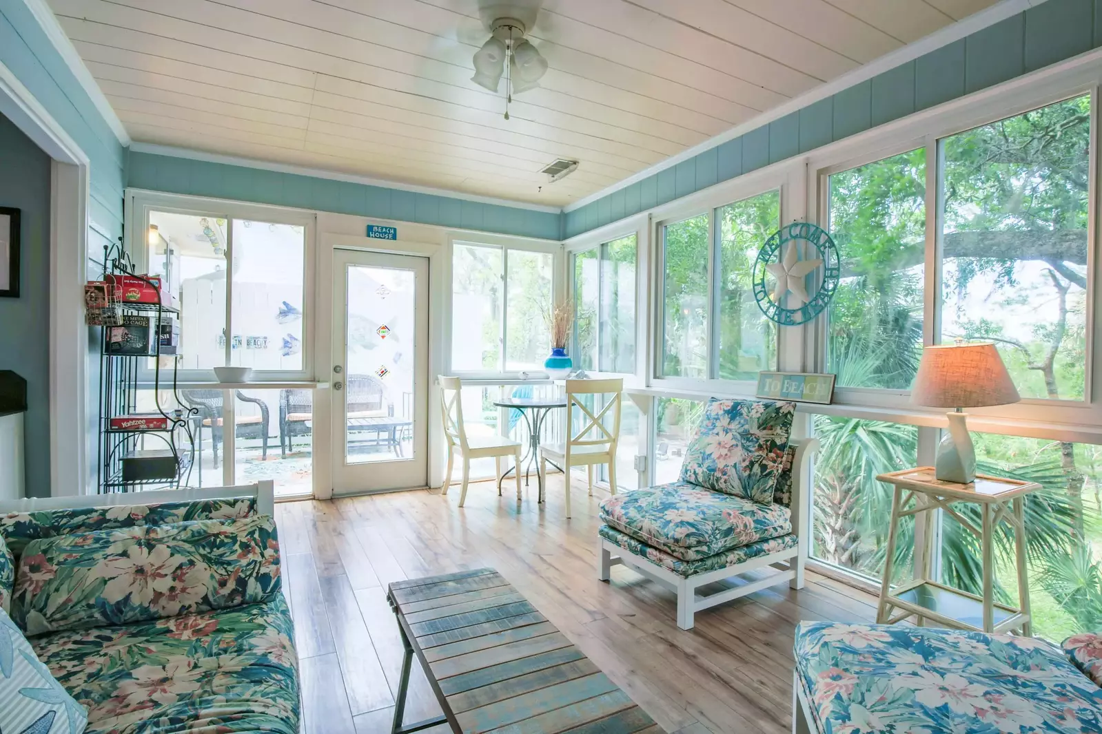 The back door in the solarium leads to the home's two back porches.